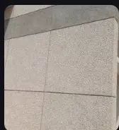Forming groove of uniform size in the top layer of washed stone grit plaster as per approved pattern using wooden battens, nailed to the under layer, including removal of wooden battens, repair to the edges of panels and finishing the groove complete as per specifications 20 mm wide and 15 mm deep groove
