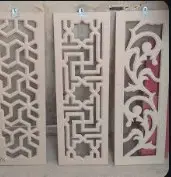 Providing and fixing plain jaffri door and window shutters including bright or/and black enamelled M.S. butt hinges with necessary screws 35x10 mm laths placed 35 mm apart (frames to be paid separately), including fixing 50x12 mm beading complete with Second class teak wood